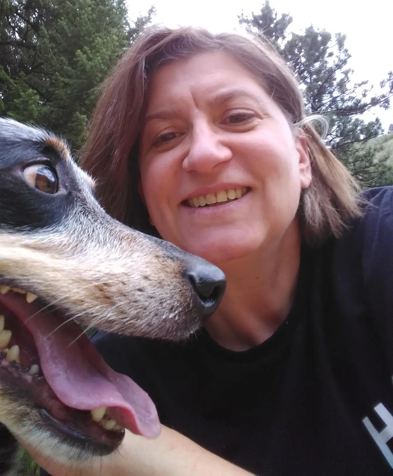 Camilla with her dog outside